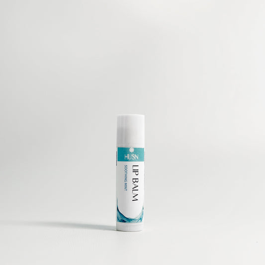 Lip balm tube on a white background